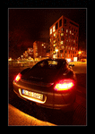 Porsche Cayman S in front of apartment houses (Scharnhauser Park)